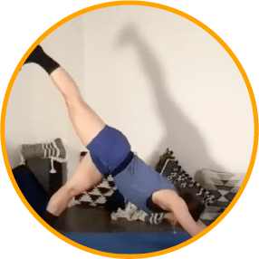 woman in one legged downward dog yoga pose